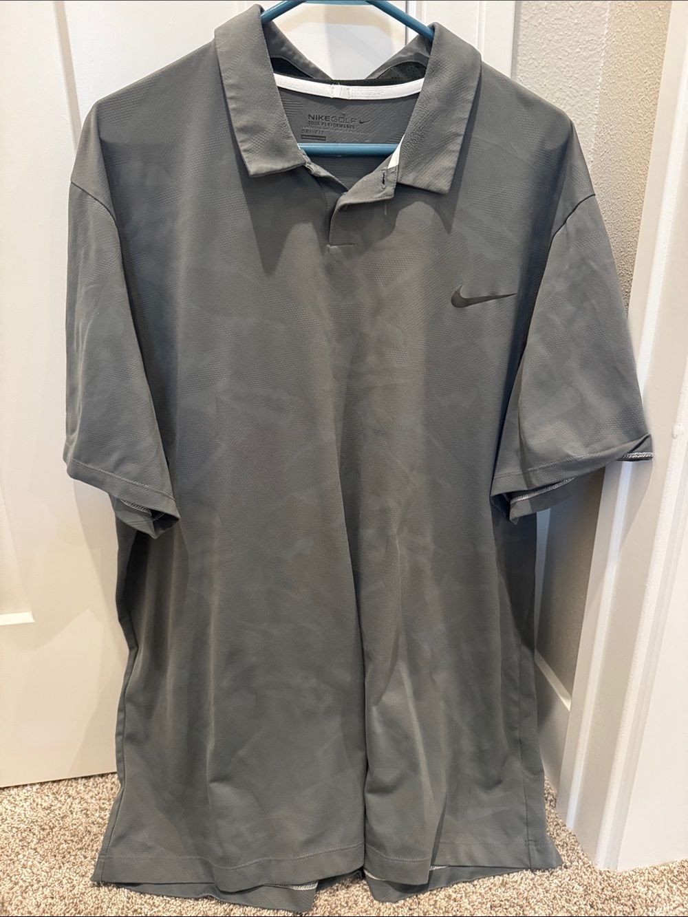 Nike Men's Gray Polo with Subtle Swoosh
